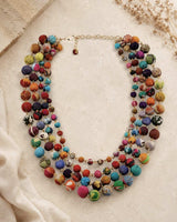 Colorful beaded necklace on a light background