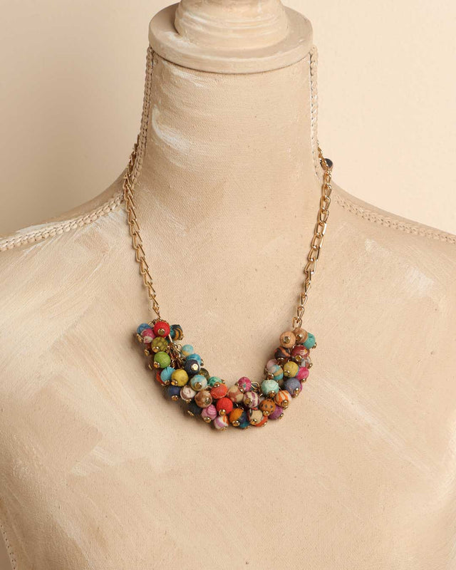 Handmade choker-style necklace with recycled fabric beads