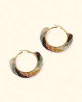 Earth-tone beaded hoop earrings handmade in Guatemala