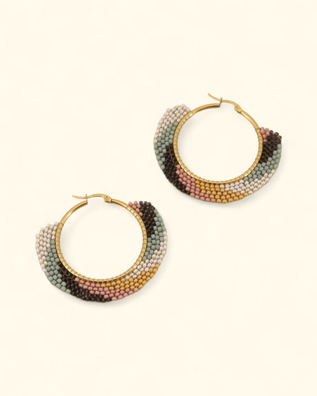 Earth-tone beaded hoop earrings handmade in Guatemala