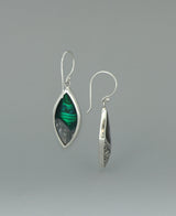 Full view of the sterling silver Abalone Shell earrings against a light background, emphasizing the intricate silver filigree and vibrant shell inlay