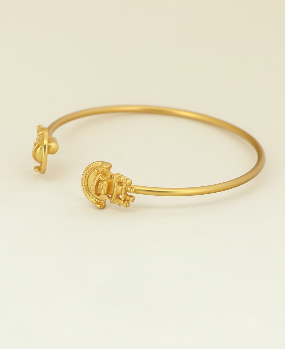 Side view of Gold Plated Tairona Symbol Cuff Bracelet, Colombia