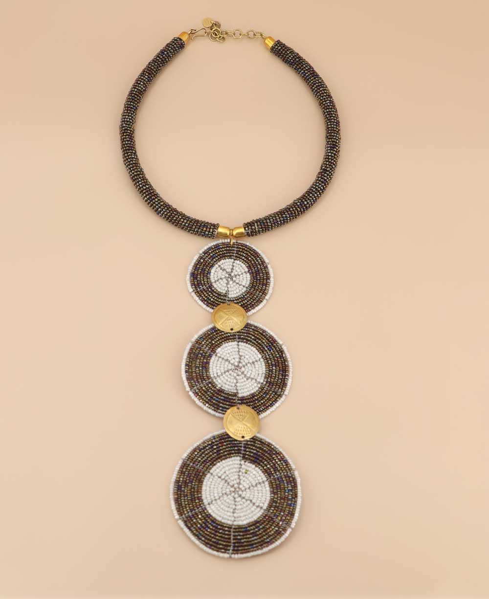 Kenyan beaded artisan jewelry with brass shilling