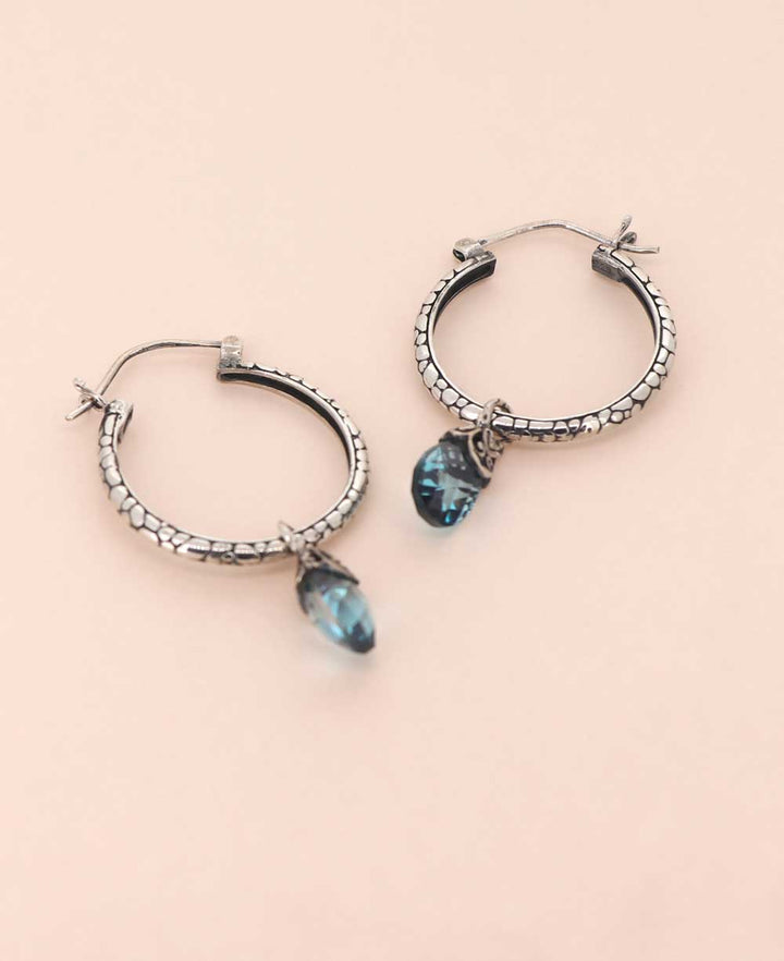 Sterling Silver Hoop Earrings with Blue Topaz Teardrop – Cultural Elements