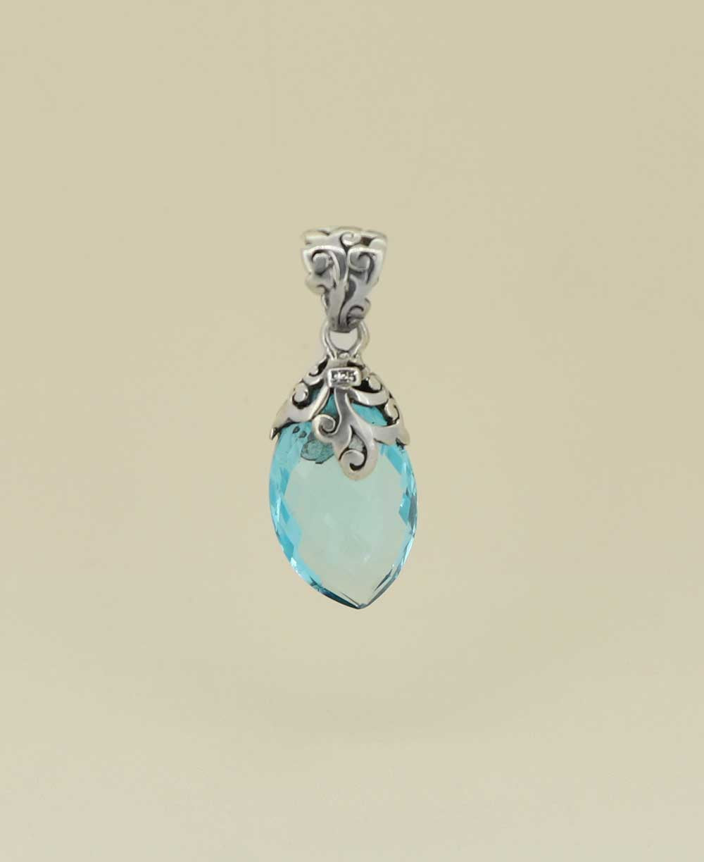 Artisan-crafted-silver-pendant-with-almond-blue-topaz