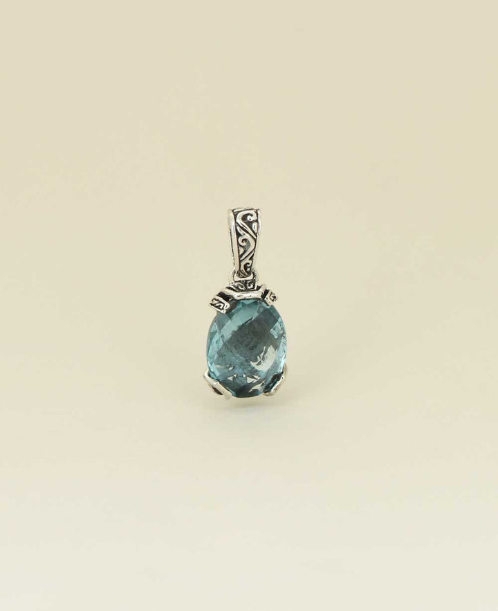 Artisan-silver-pendant-with-large-blue-topaz