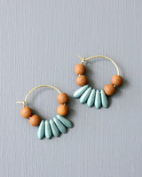 Earth-toned and aqua teardrop earrings in gold