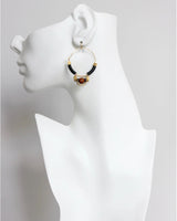 Handcrafted hoop earrings with vintage-style vulcanite discs