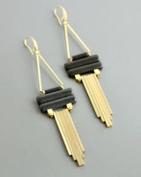 Geometric chandelier earrings with cascading brass rods