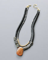 Layered artisan necklace with tourmaline and emperor stone