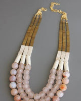 Handmade statement necklace in earthy pinks and neutrals