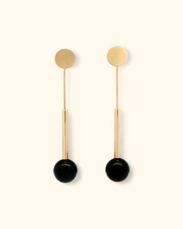 Black onyx and brushed gold linear earrings