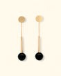Black onyx and brushed gold linear earrings