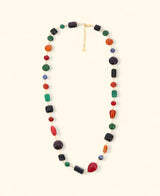 Eclectic multicolor stone necklace laid in soft curve
