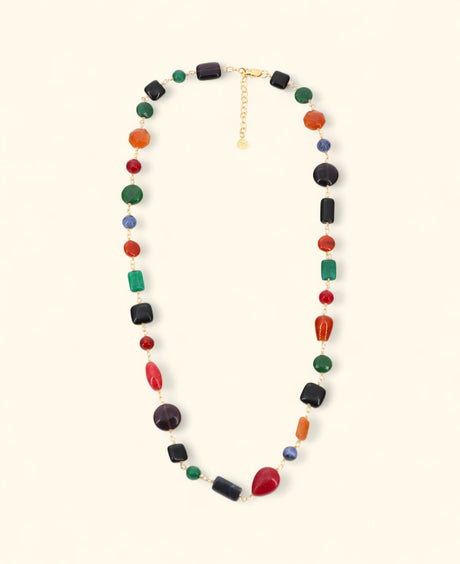 Eclectic multicolor stone necklace laid in soft curve