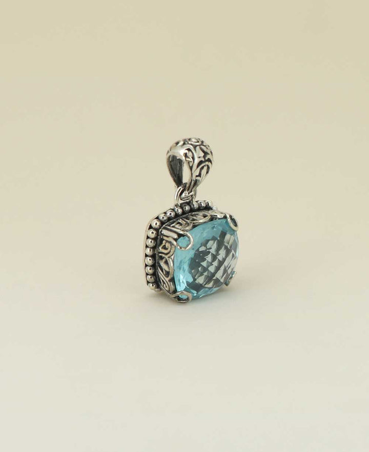 Square-cut-blue-topaz-pendant-in-filigree-frame