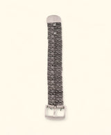 Pewter belt-inspired stretch bracelet on neutral background