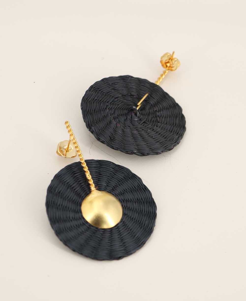 Handwoven black and gold palm disc earrings