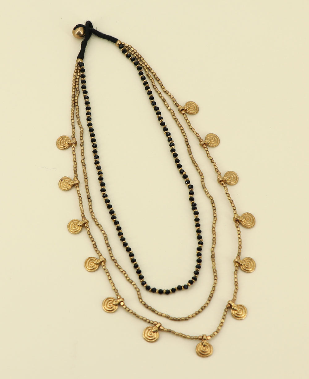 Artisan-crafted triple strand bead necklace