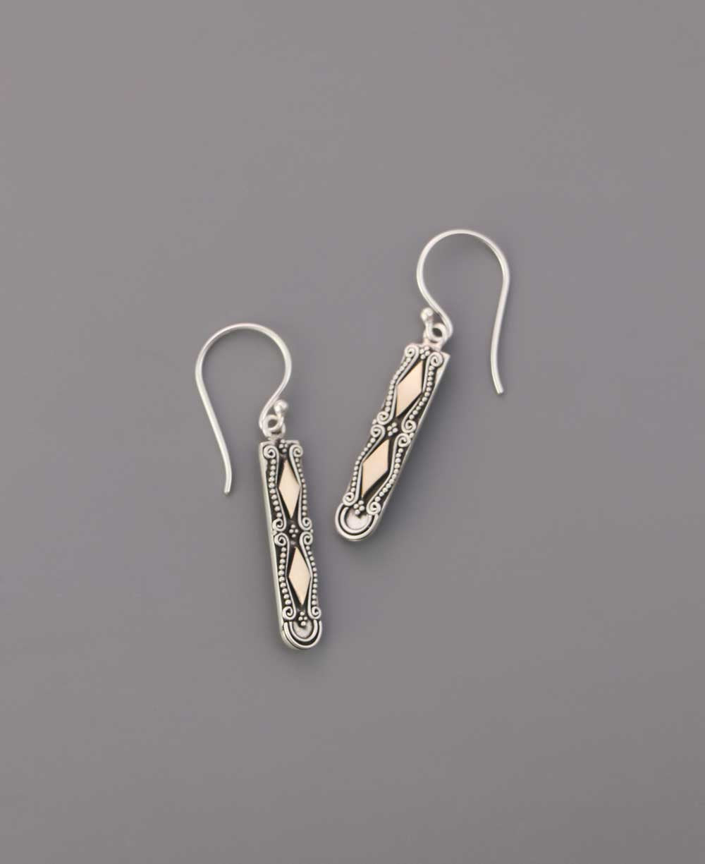 Sterling silver filigree earrings with diamond detail