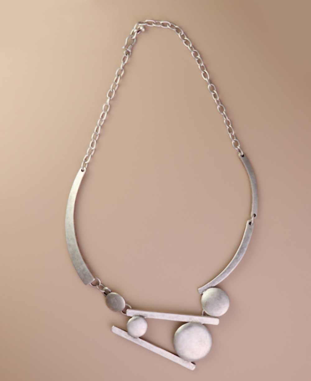 Adjustable geometric disc necklace