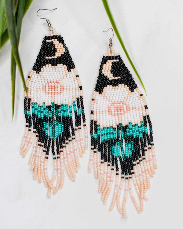 Statement fringe earrings with moon and floral bead design