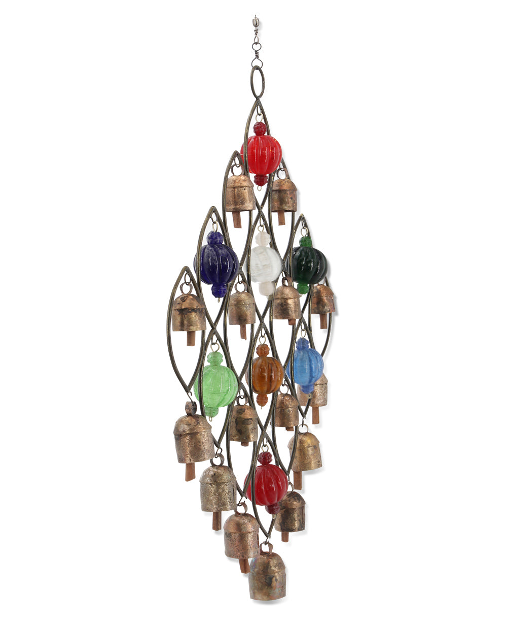Beautifully arranged recycled metal bell chime wall hanging in home or garden