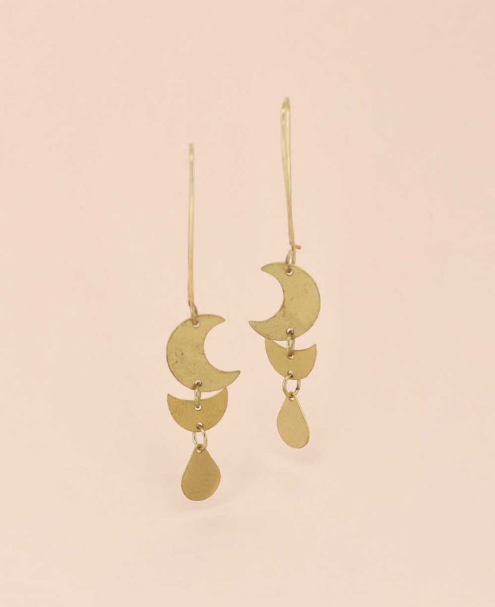 Close-up of Brass Moon Phase Earrings