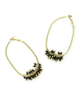 Gold-plated brass hoop earrings with black glass beads.
