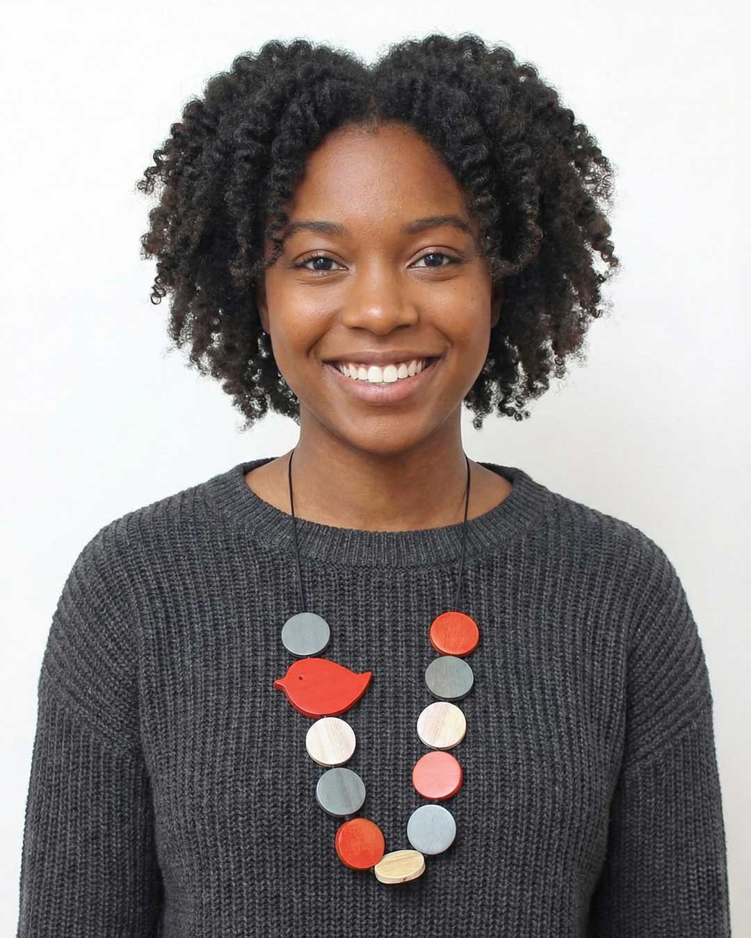 Adjustable wood bead necklace with red robin accent