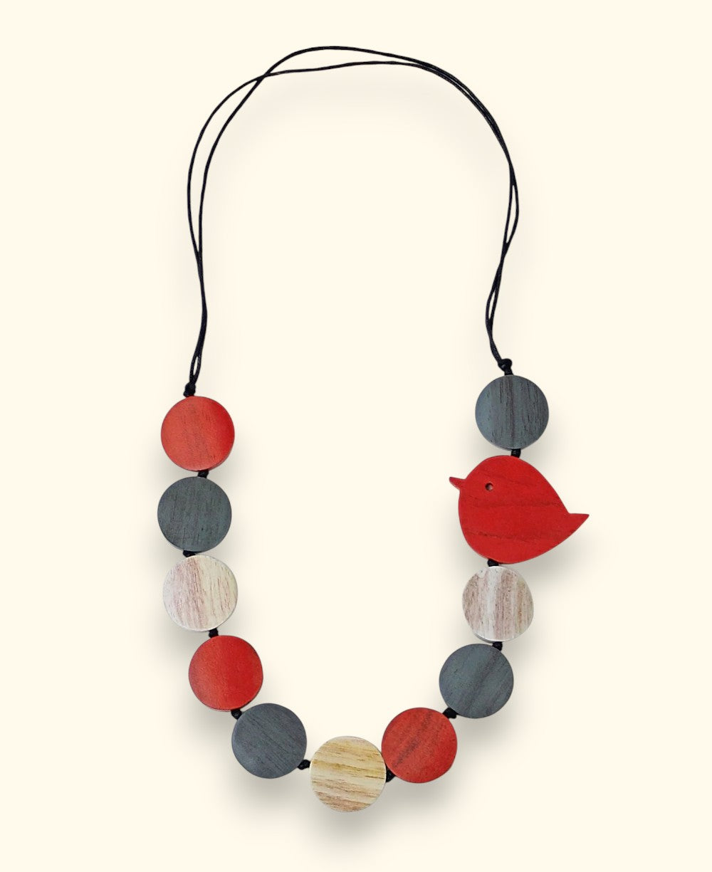 Artisan necklace with natural dyed wooden discs