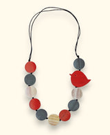 Artisan necklace with natural dyed wooden discs