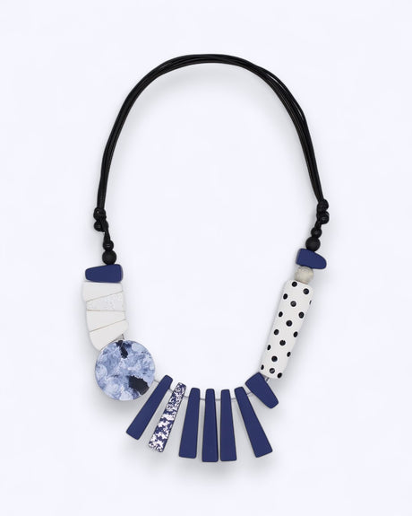 Artistic resin necklace with polka dots, marble, and abstract patterns