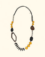 Artisan necklace with bold yellow, black, and brown wood beads