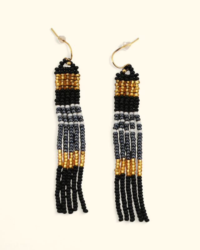 Black, white, and gold beaded column earrings