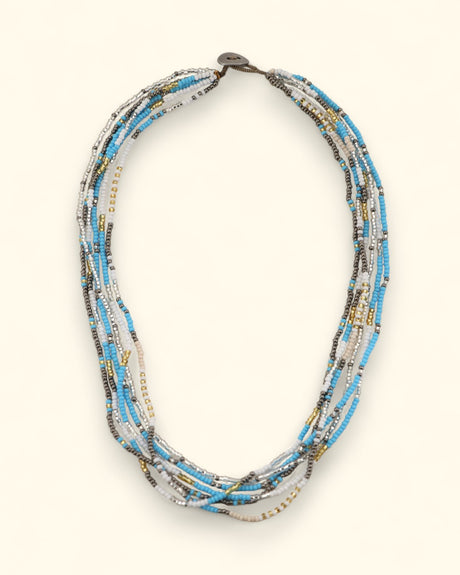 Multistrand beaded necklace with turquoise, white, and gold beads