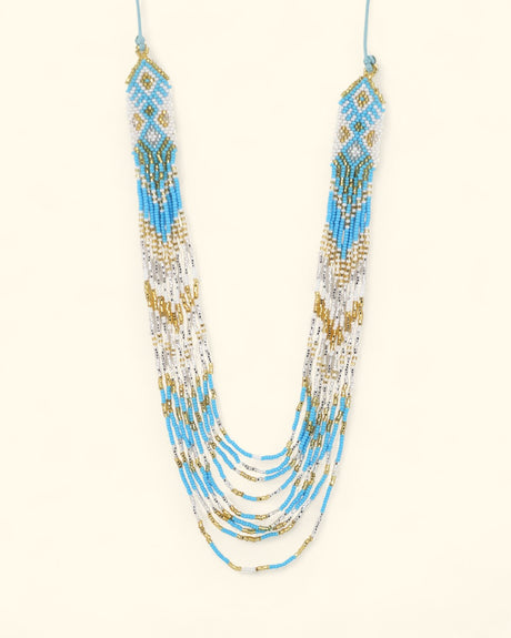 Layered beaded necklace in blue, white, and gold