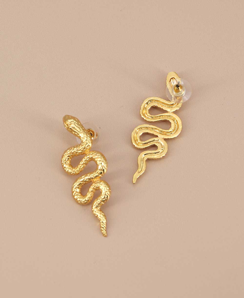 Gold plated serpent shaped earrings with etched detailing
