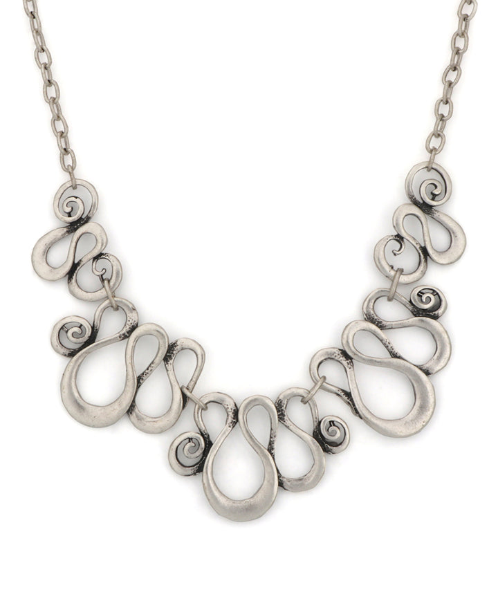 Swirly curves statement necklace