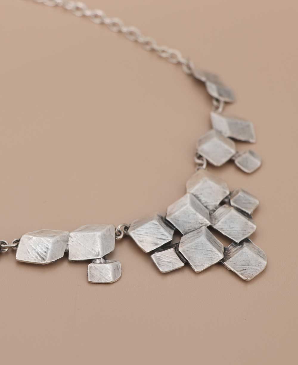 Textured surface artistic necklace