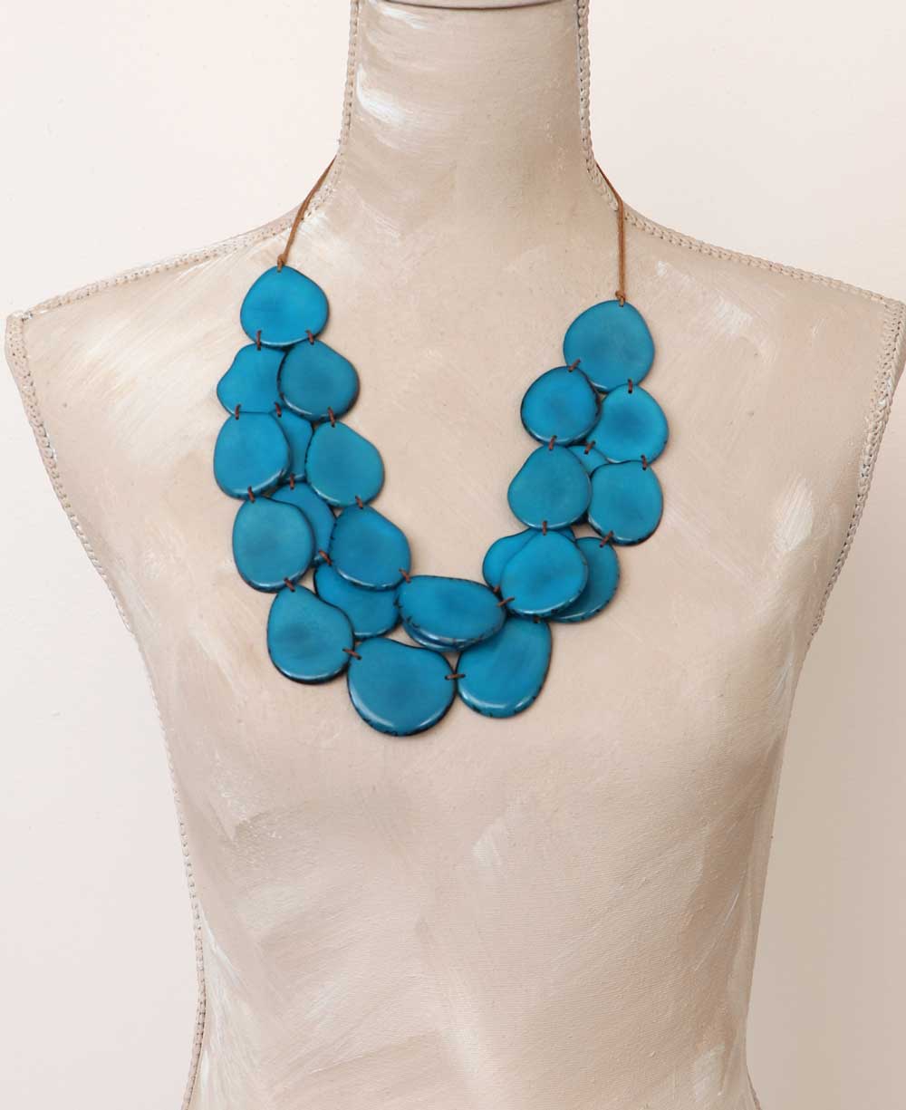 Asymmetrically Strung Tagua Discs