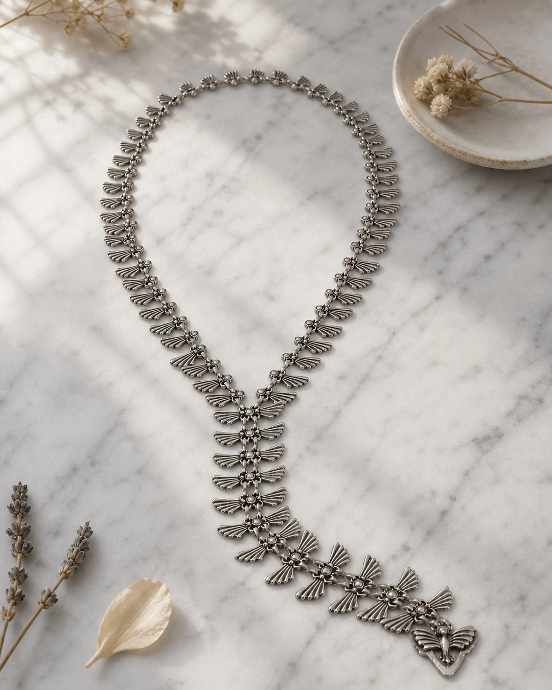 Artistic Wings Y-Necklace — necklaces, editorial marble lifestyle photo