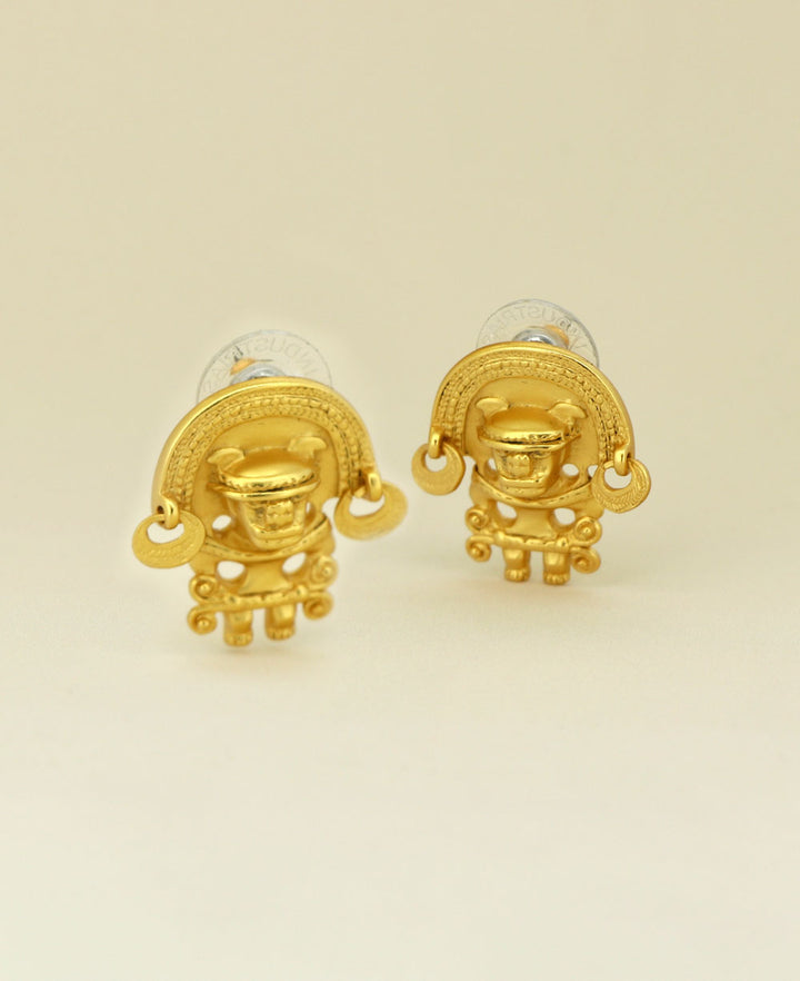 Close-up image of the Gold Plated Tairona Symbol Earrings highlighting the intricate design and glowing gold plating