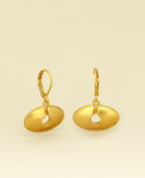 Close-up view of the Gold Plated Pre-Colombian Oval Keyhole Symbol Earrings, showcasing the exquisite design and gold plating