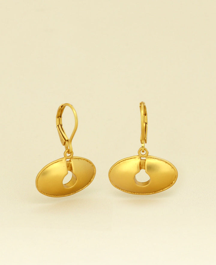 Close-up view of the Gold Plated Pre-Colombian Oval Keyhole Symbol Earrings, showcasing the exquisite design and gold plating