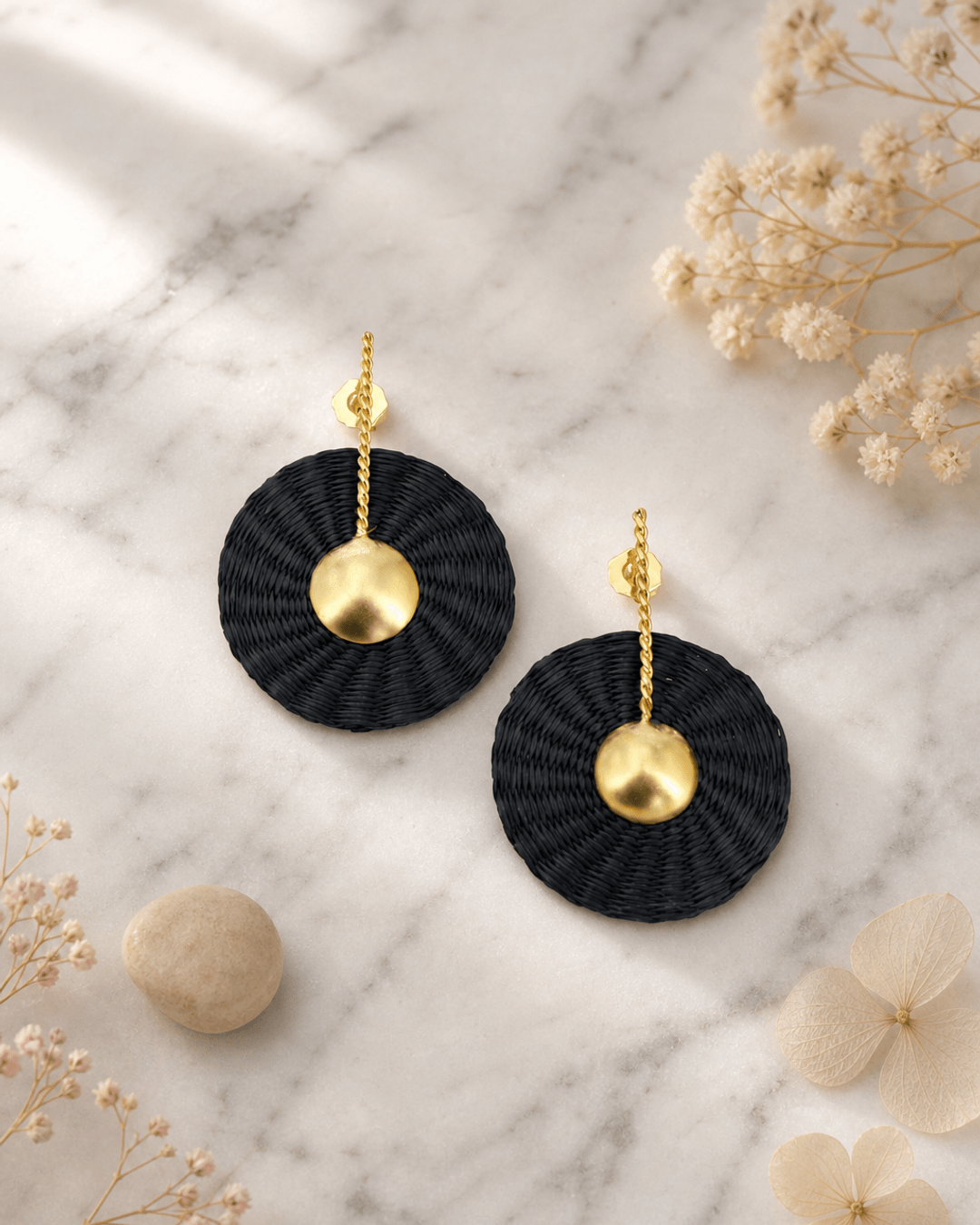 Colombian Artisanal Gilded Iraca Palm Earrings — earrings, editorial marble lifestyle photo