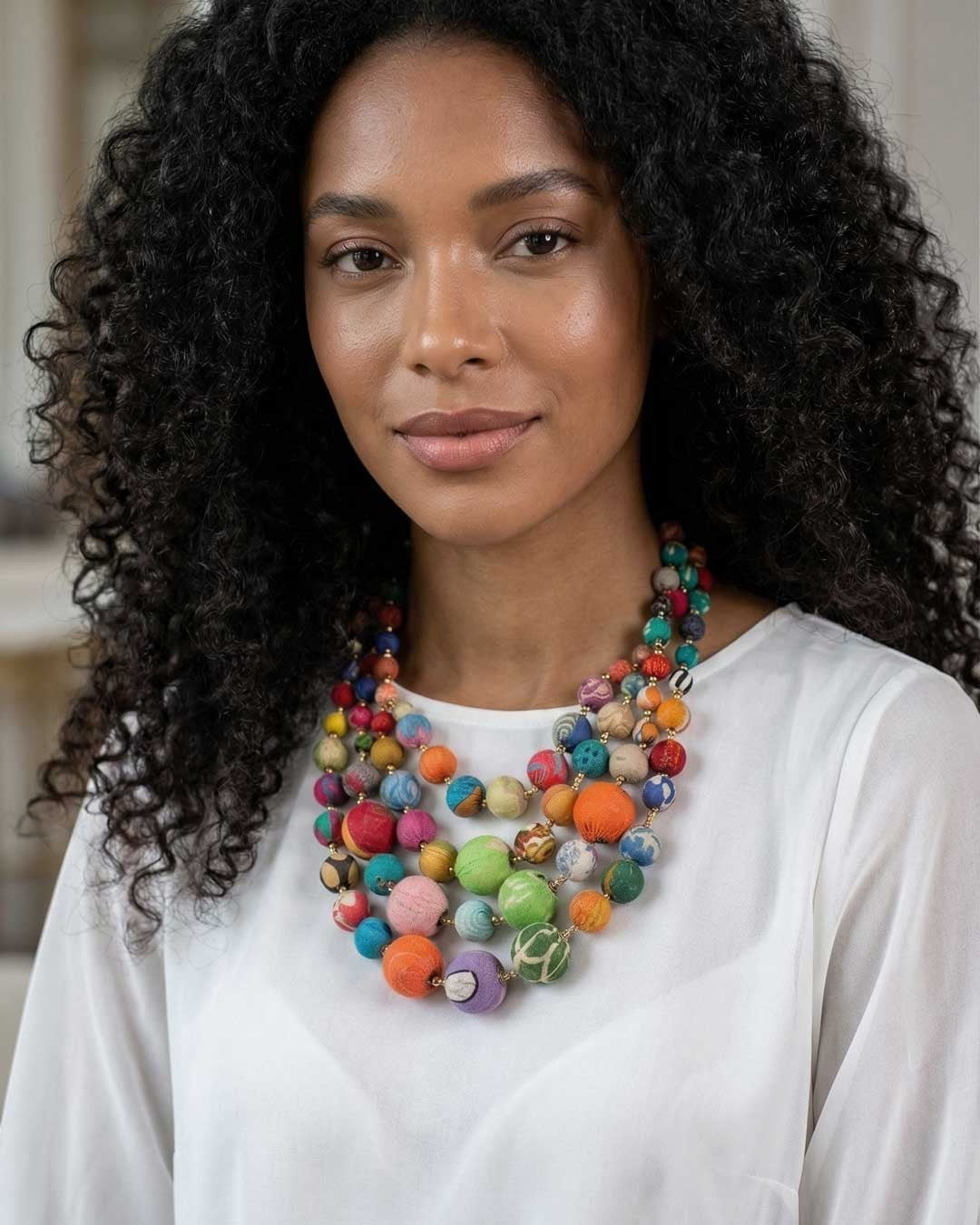 Cultural Elements multi-strand statement necklace with colorful recycled textile beads.