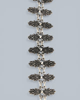 Cultural Elements antique silver tone lariat necklace with ornate Hamsa pendant and repeating links.