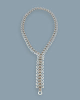 Cultural Elements silver-tone metal alloy lariat necklace with cutout discs and Y-shaped silhouette.