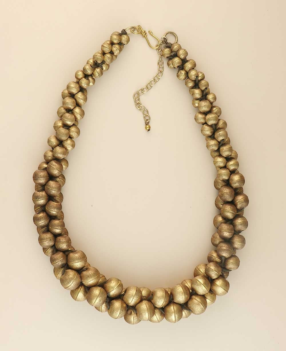 Cultural Elements antique gold-tone layered statement necklace with twisted beads and extender chain.